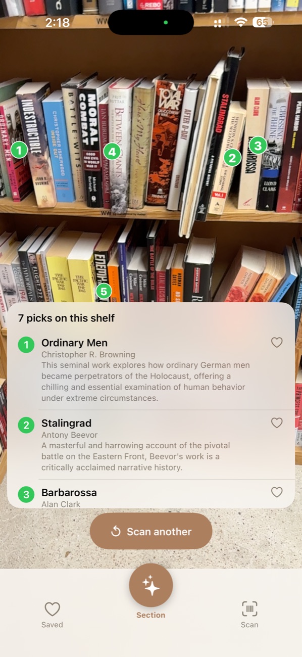 Bookstore Companion scanning a real bookstore shelf — seven picks pinned on the spines with short verdicts